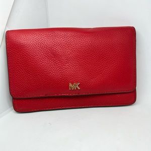 Red Michael kors wallet/ clutch.